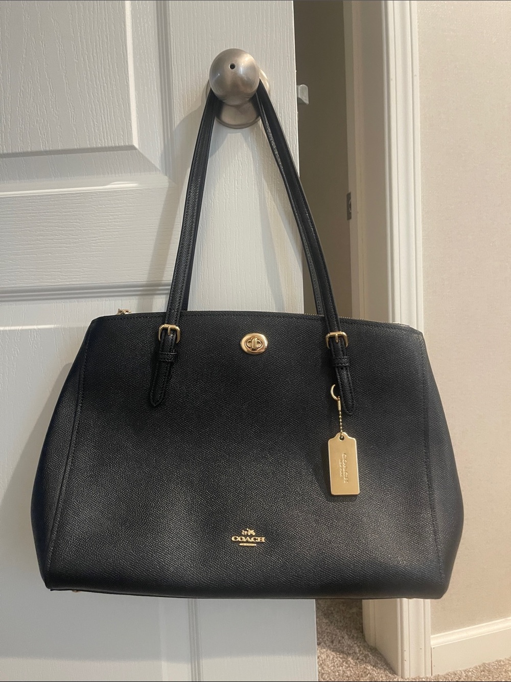 NWT coach black turnlock carryall bag